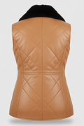 Rear view of tan quilted leather vest showing symmetric diamond quilting and vertical center seam. The Isabelle by Maverick Jacket.
