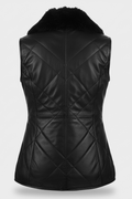 Rear view of black quilted leather vest showing symmetric diamond quilting and vertical center seam. The Isabelle by Maverick Jacket.