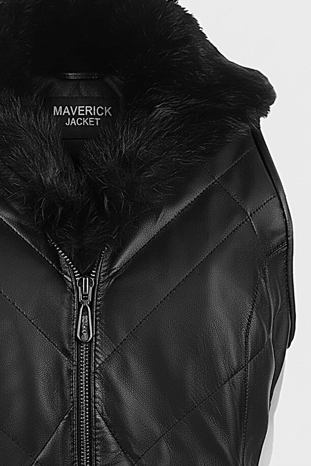 Macro shot of black diamond quilted leather texture and black fur collar detail on vest. The Isabelle by Maverick Jacket.