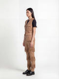 Side profile of Maverick Victoria utility vest showing sleeveless design and structured torso silhouette. Maverick Jacket.