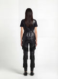 Rear view of female model wearing Maverick Victoria utility vest showing sleek back fit and belted waist styling. Maverick Jacket.