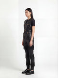 Side profile of Maverick Victoria utility vest showing sleeveless design and structured torso silhouette. Maverick Jacket.