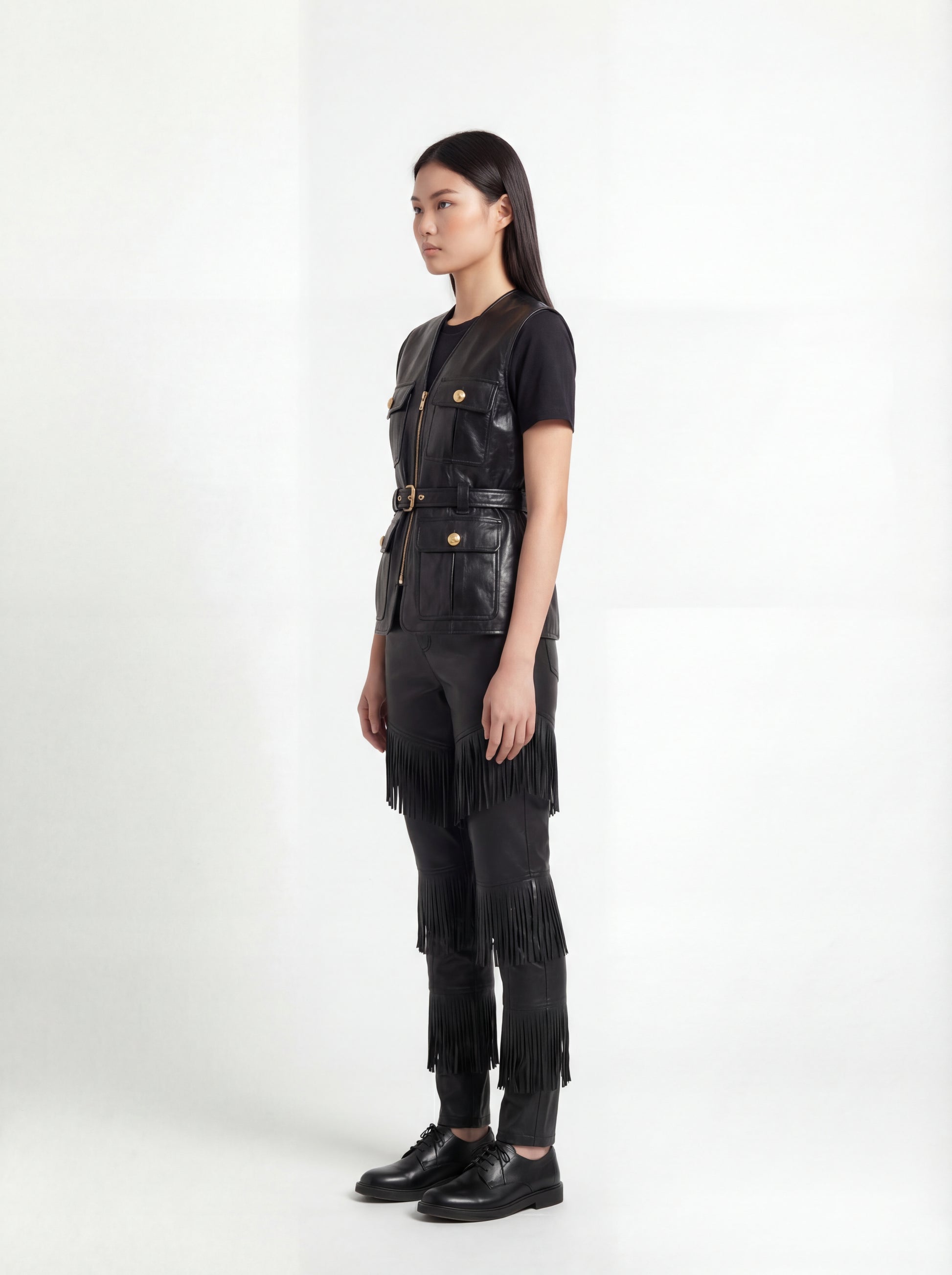Side profile of Maverick Victoria utility vest showing sleeveless design and structured torso silhouette. Maverick Jacket.