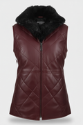 Women's burgundy quilted leather vest with black fur collar and diamond stitching, Front View. The Isabelle by Maverick Jacket.