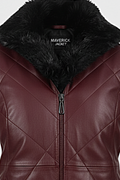Macro shot of burgundy diamond quilted leather texture and black fur collar detail on vest. The Isabelle By Maverick Jacket.