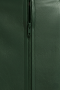 Macro shot of pebbled brown leather texture and discreet zipper closure on mini skirt. The Orla by Maverick Jacket.