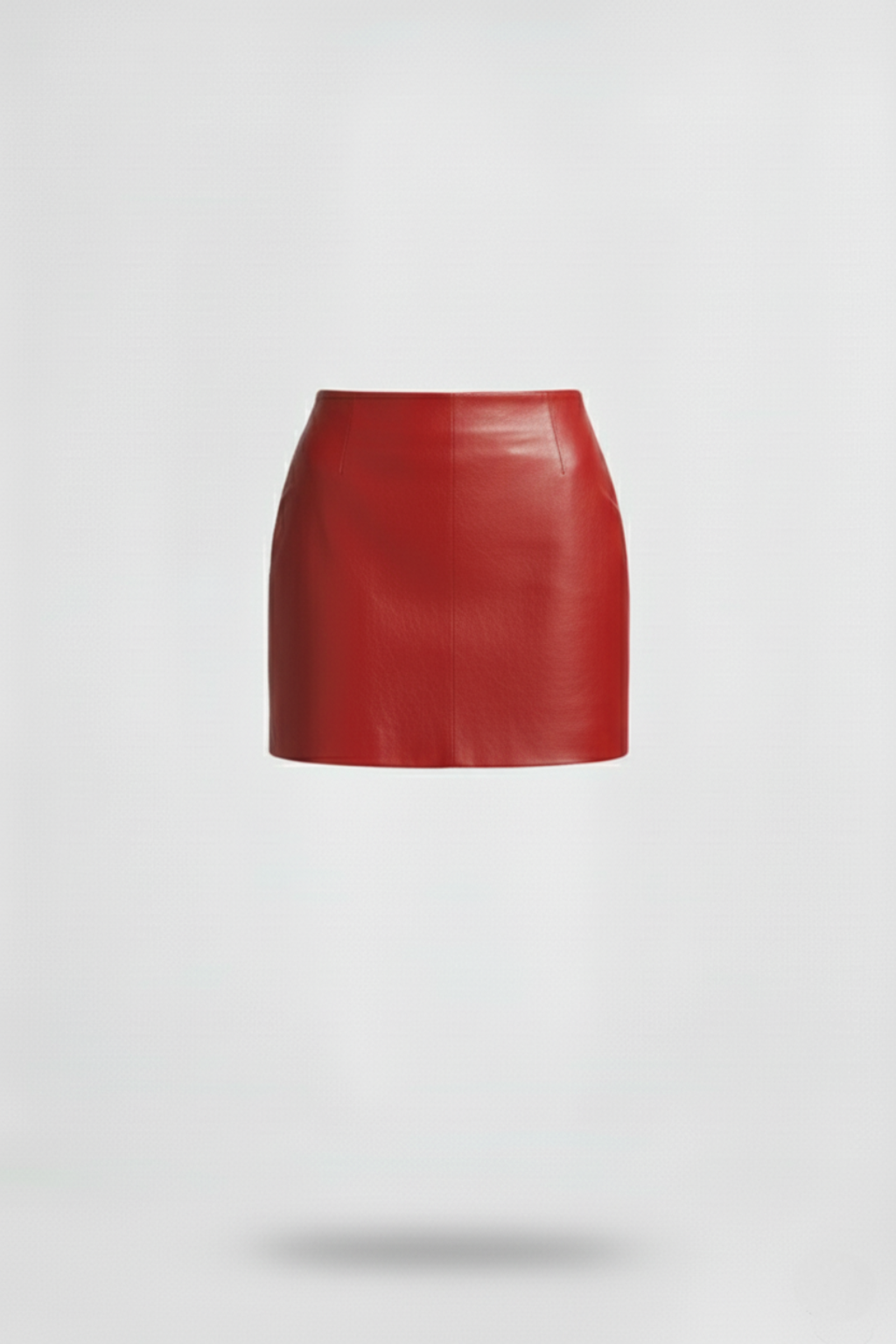 Women's red leather mini skirt with high waist fit and vertical paneling seams, Front View. The Orla by Maverick Jacket.