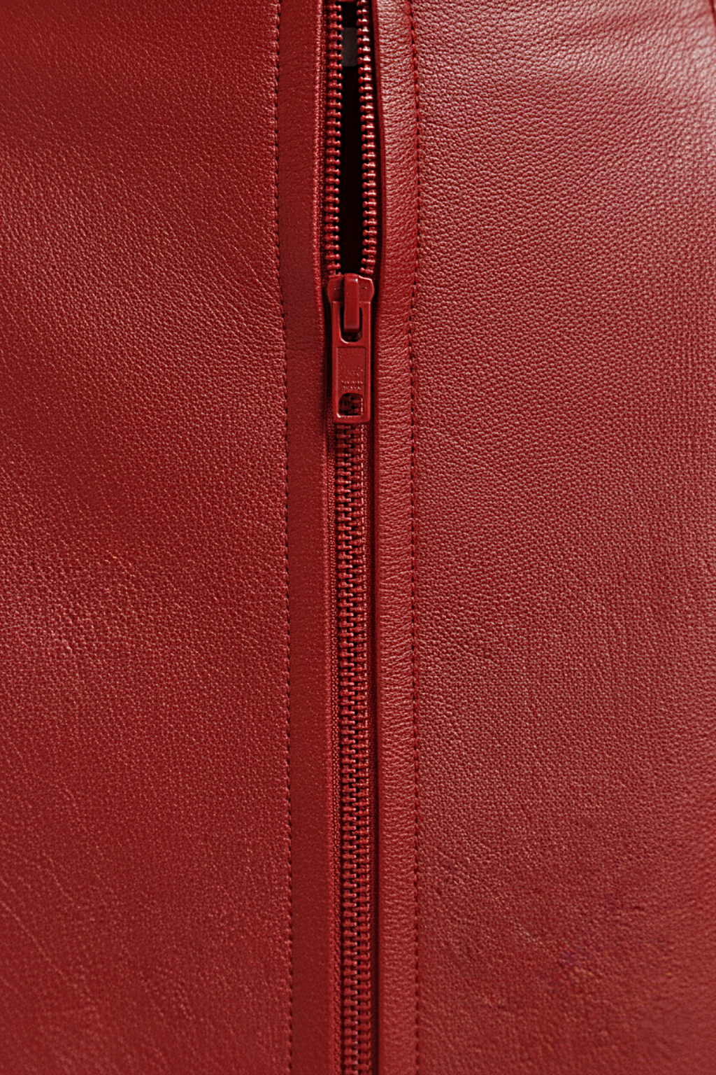 Women's red leather mini skirt with high waist fit and vertical paneling seams, Front View. The Orla by Maverick Jacket.