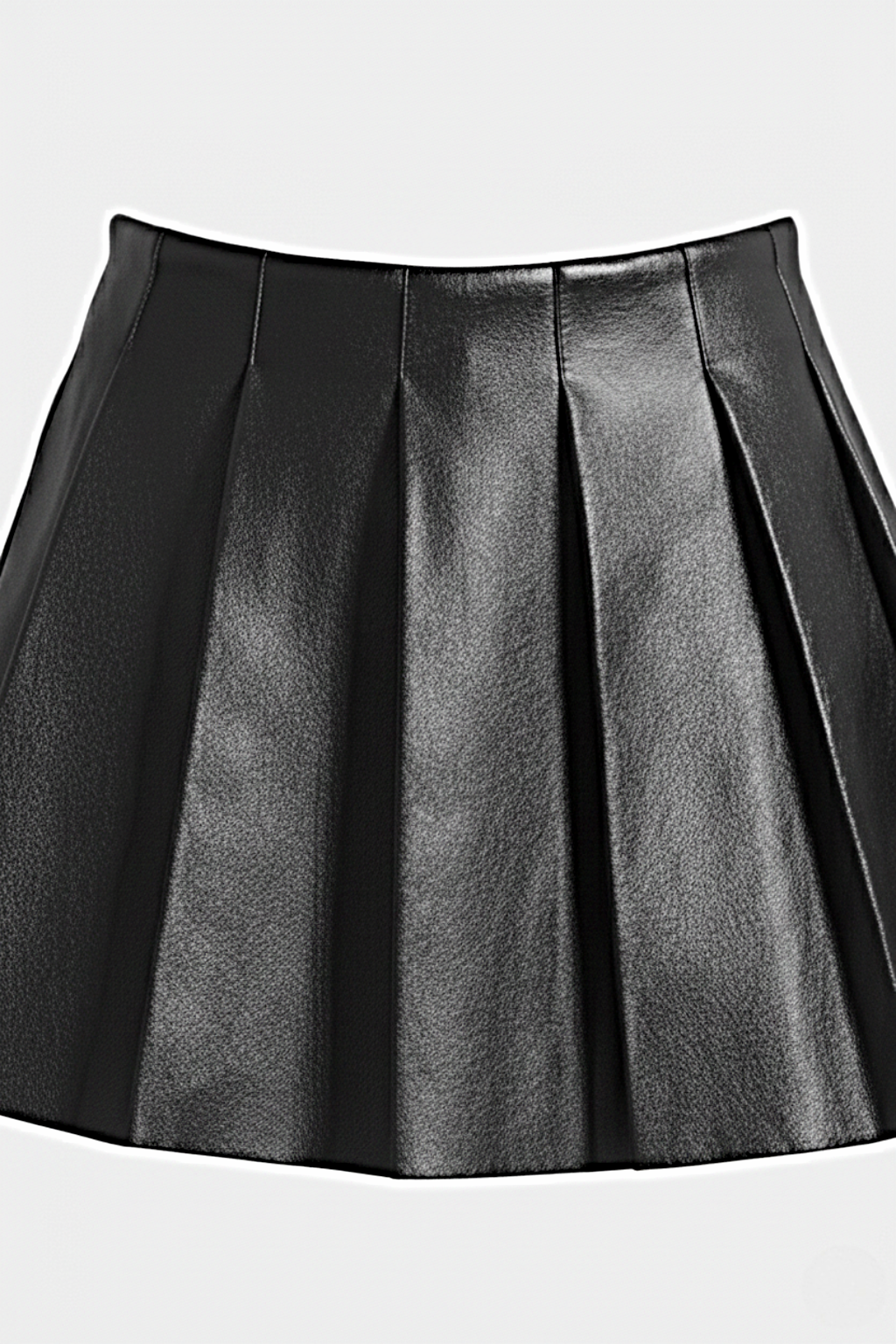 Macro shot of smooth black leather grain and structured knife pleat detailing on skirt. The Poppy by Maverick Jacket.