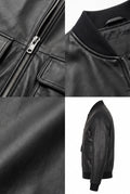 Close-up of the Maverick Rhys black leather bomber jacket, showing its polished silver zipper and rectangular pull.