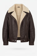 Maverick Taryn B-3 shearling bomber jacket, front flat lay with brown leather, cream shearling lapels and asymmetrical zip.