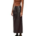 Woman posing in a brown leather skirt